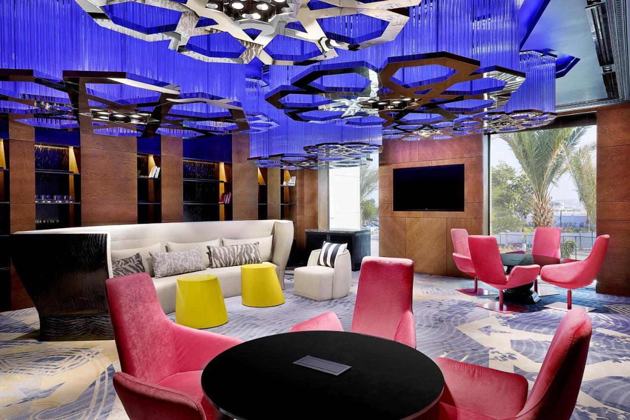 W Muscat Hotel Exterior foto The W lounge at Beijing Capital International Airport