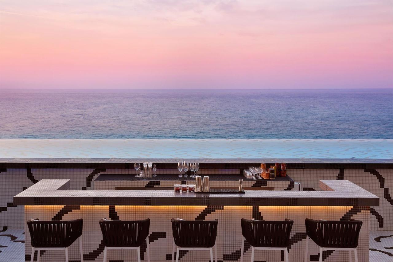 W Muscat Hotel Exterior foto The Bar