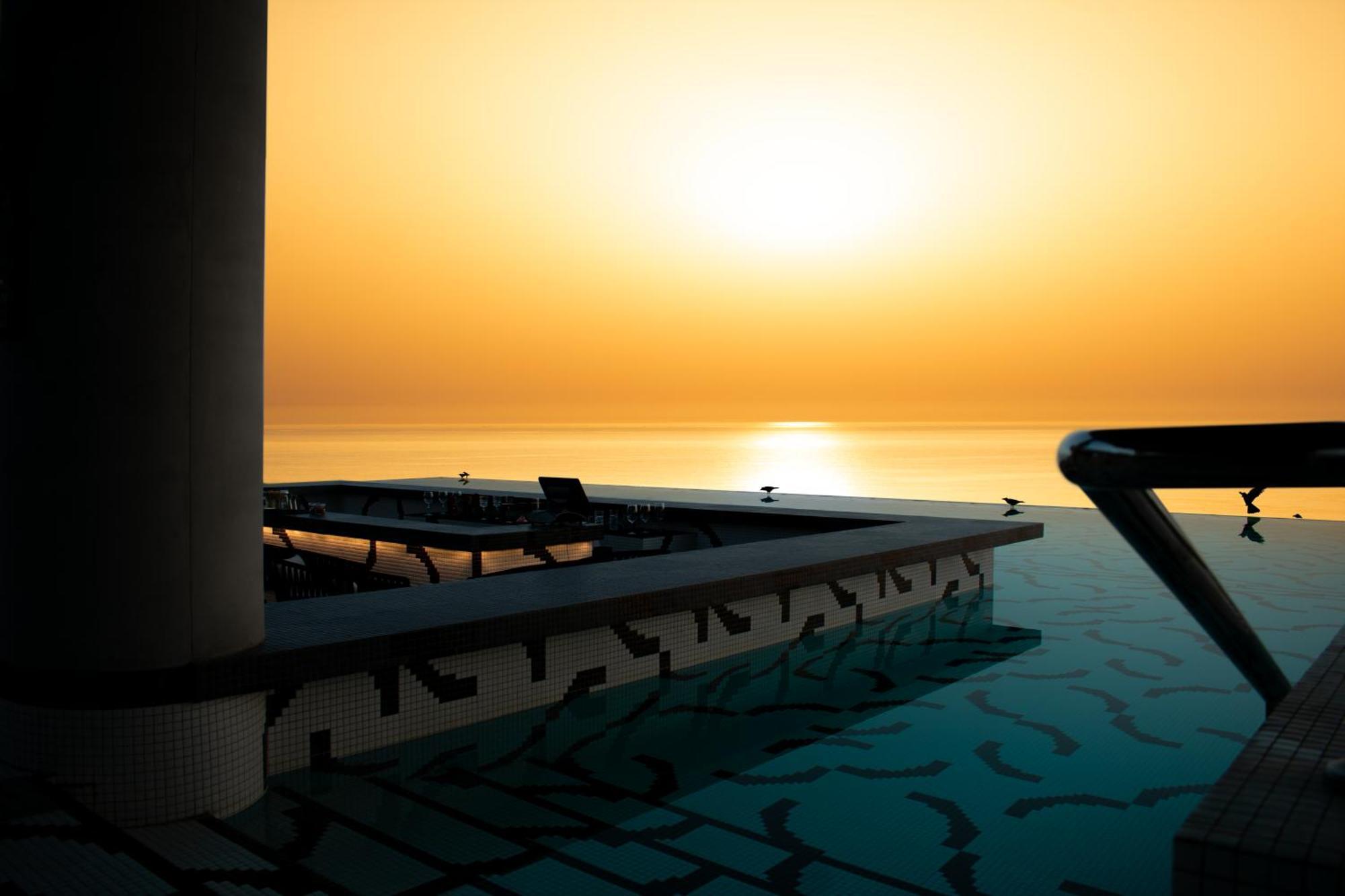 W Muscat Hotel Exterior foto Sunset at the Dead Sea