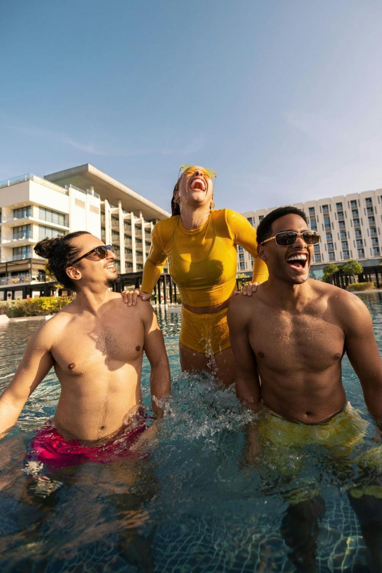W Muscat Hotel Exterior foto The swimming pool at the Hilton Sharm El Sheikh Resort